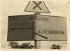 Znak drogowy na trasie wojsk niemieckich