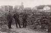 Germans posing at front burnt synagogue and demolished jewish quarter